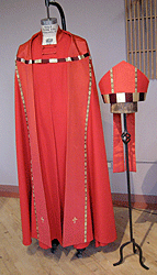 Scarlet cope and mitre